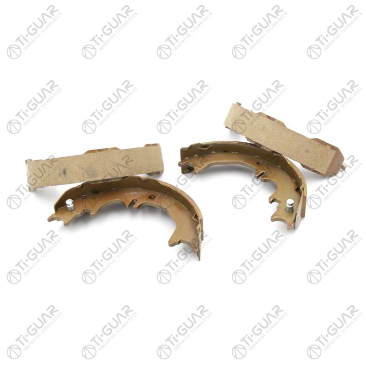 Тормозные колодки (КОМПЛЕКТ 4шт/РУЧНОГО ТОРМОЗА) TG-46540-60060/FN0642* Ti·GUAR Тормозные колодки (КОМПЛЕКТ 4шт/РУЧНОГО ТОРМОЗА) TG-46540-60060/FN0642* Ti·GUAR